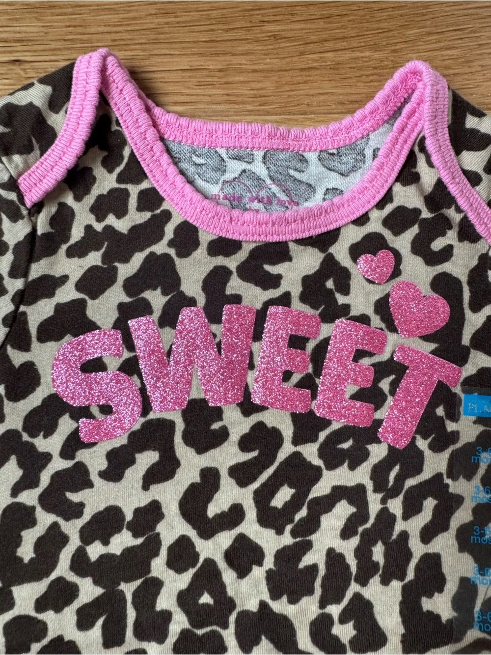 The Children's Place Leopard Print Bodysuit with Pink Trim and Glitter 